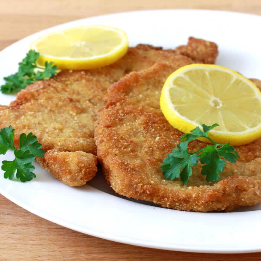 Authentic German Pork Schnitzel: Tender, Crispy, & Irresistible